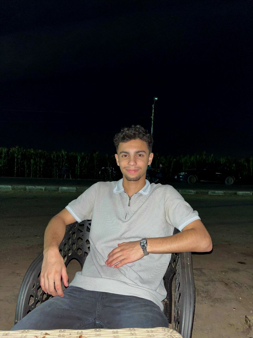 Portrait of a professional front-end developer with a modern office background